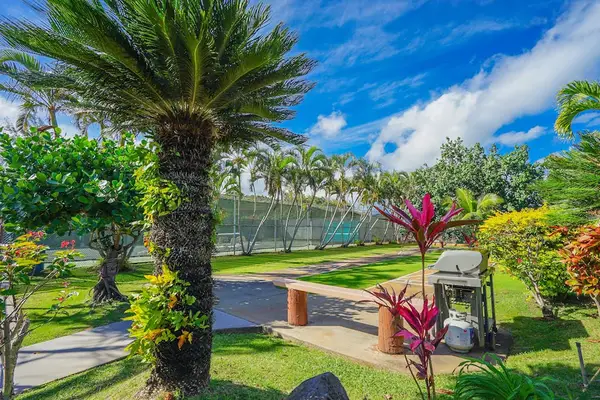 Beautiful tropical landscaping surrounding the resort amenities