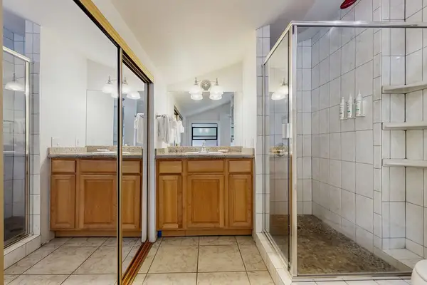 Guest bathroom with walk-in shower.