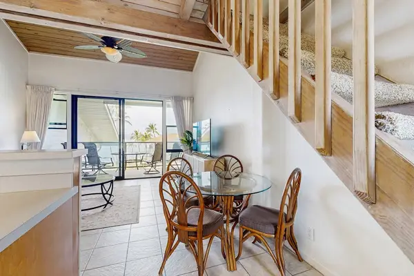 Dining room with views through to the lanai.