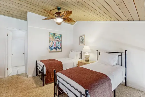 Guest bedroom with two twin beds.