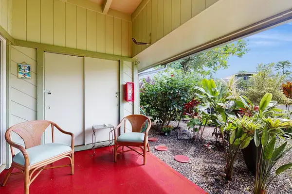 Peaceful Lanai Surrounded By Island Greenery