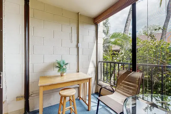Private Covered Balcony with Comfortable Seating & Scenic Nature Views