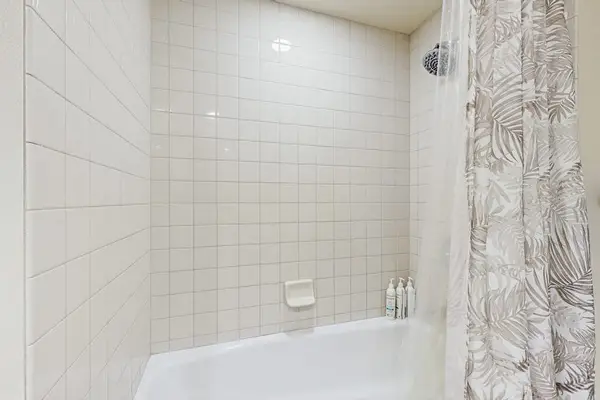 Full Bathroom With Tub And Shower