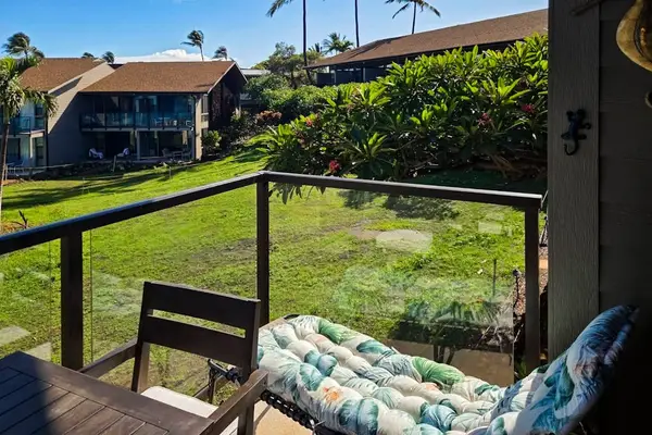 Private Balcony Overlooking Lush Gardens