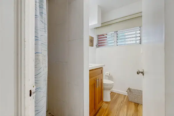 A comfortable bathroom retreat offering a clean and refreshing shower experience.