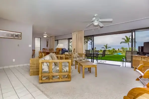 Living room connects kitchen dining and lanai with island views