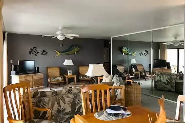 Dining area opens toward comfortable seating and island inspired interiors