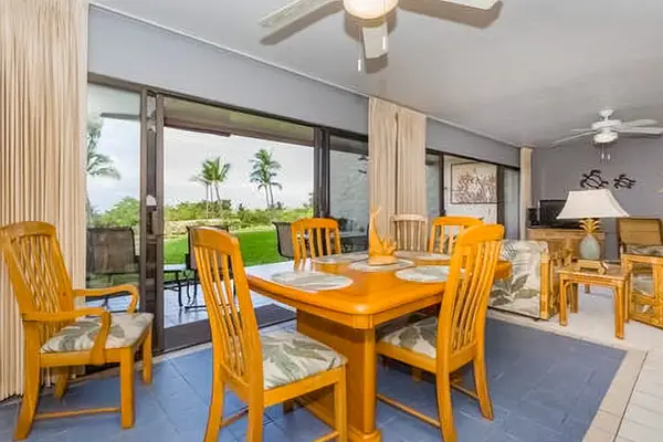 Warm dining table creates an inviting setting for island meals