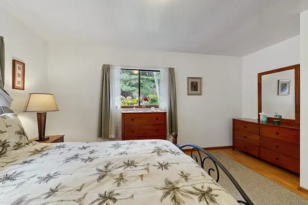 Bright Primary Bedroom With Garden Views