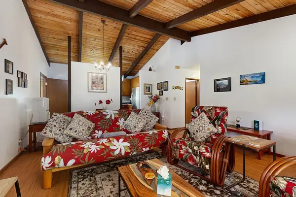 Cozy Living Room With Vaulted Ceilings