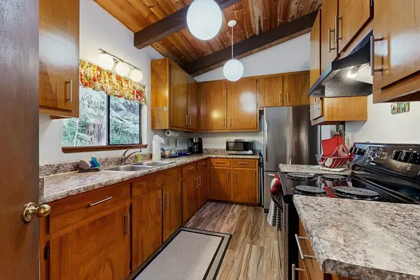 Well Equipped Kitchen With Granite Counters