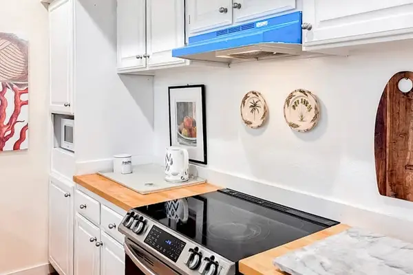 Well-appointed kitchen creates inviting space for preparing breakfast lunch and dinner daily