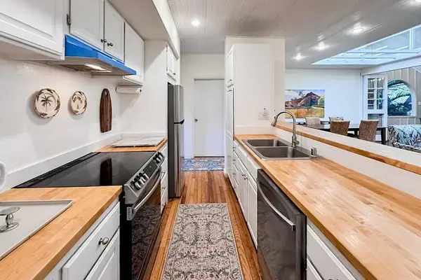 Enjoy cooking favorite recipes inside this bright and practical kitchen every day