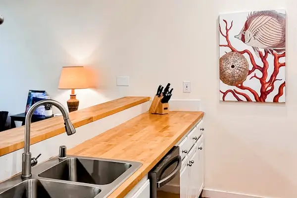 Gather around the kitchen while preparing delicious meals with family and friends
