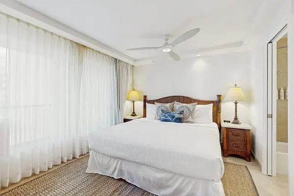 Comfortable king bed with soft linens.