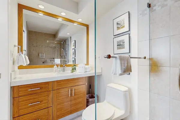 Clean full bathroom with a walk-in shower