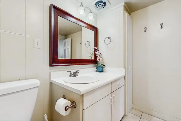 Master bathroom with tiled walk in shower.