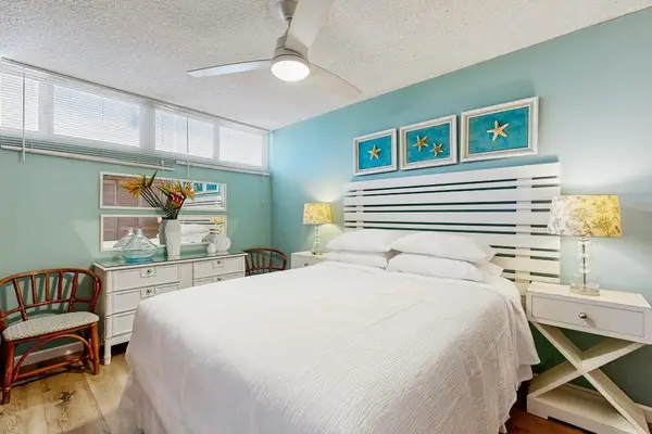 Master bedroom with queen bed and en suite bathroom.