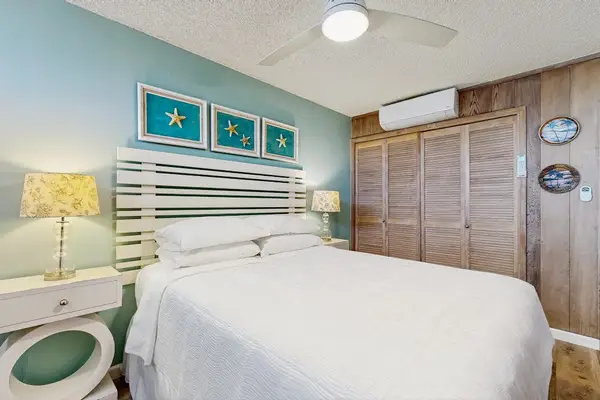 Master bedroom with queen bed and en suite bathroom