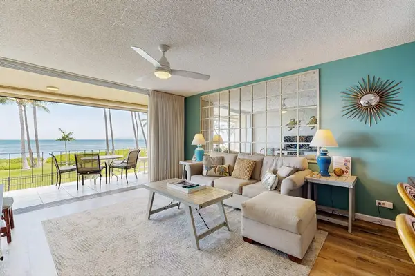 Living room with great views with lots of natural light.