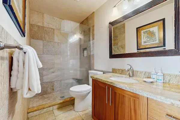 Pristine Modern Bathroom Featuring Elegant Custom Tile Work