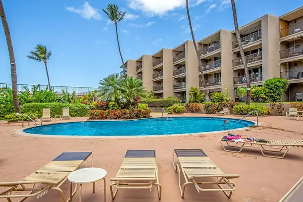 Sunny Pool Deck Made For Relaxation