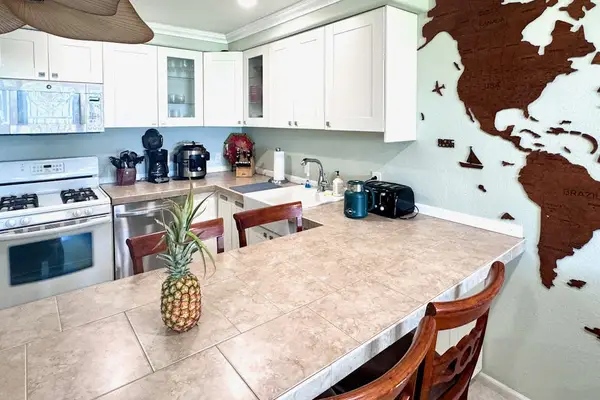 Open dining area creates a cheerful setting for breakfast lunch and dinner with loved ones