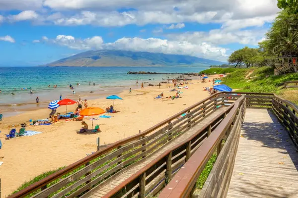 Scenic beach access with golden sand and turquoise water