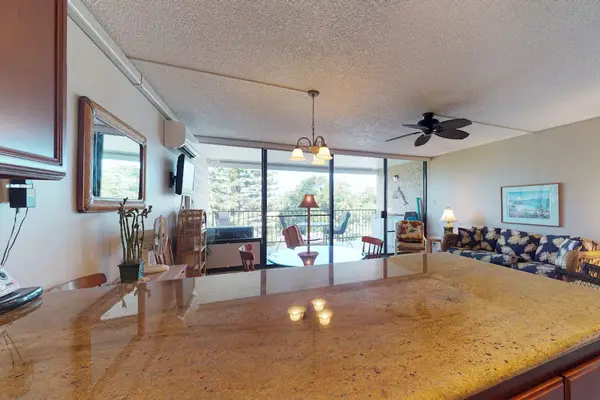 Airy living room opening to the lanai