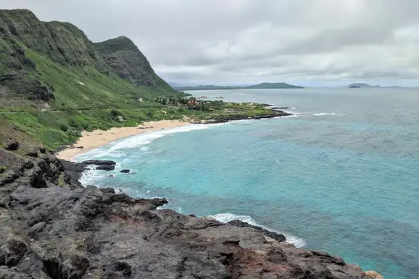 Turquoise shoreline and mountain scenery create a memorable island view