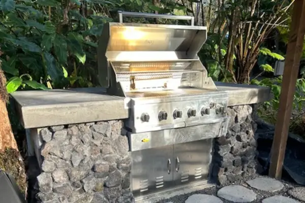 Sit outside and enjoy a glass of wine while you cook on your gas grill.
