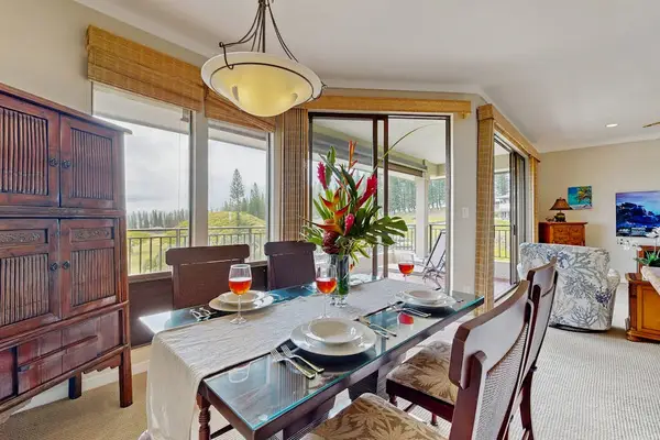 Dining room next to pictruesque windows so that you can enjoy a view while you eat.
