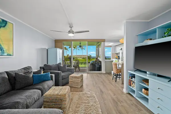 Spacious updated living room with comfortable seating with a sectional and chair while you enjoy relaxing in front of your flat screen TV.