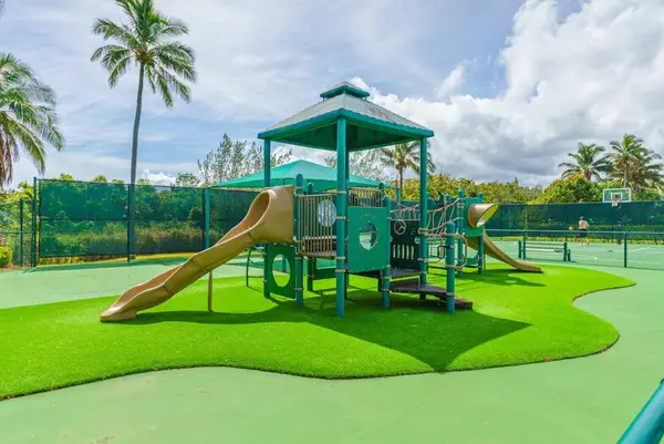 Unwind beneath swaying palms and tropical greenery daily