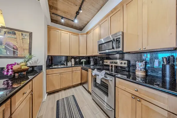Modern, Fully Equipped Kitchen Ready For Island Cooking