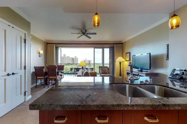 Cozy kitchen area with spacious counters, perfect for preparing quick snacks or a morning breakfast to recharge.