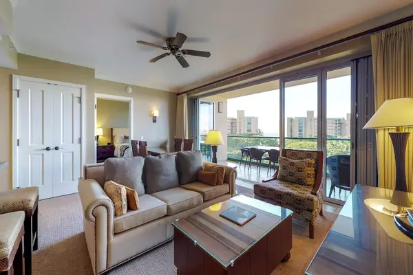 Beautiful and breezy living room with comfortable seating, perfect to take a break and relax.