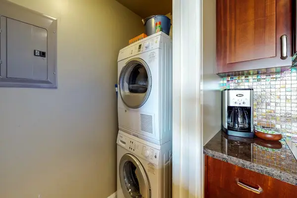 Stack washer dryer in unit
