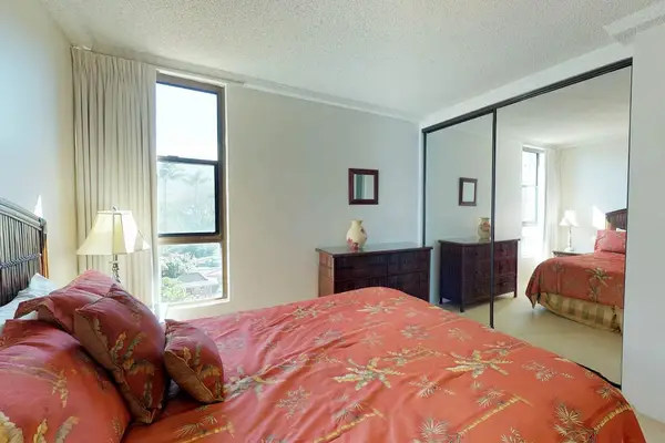 Master bedroom with king bed and lots of natural light.