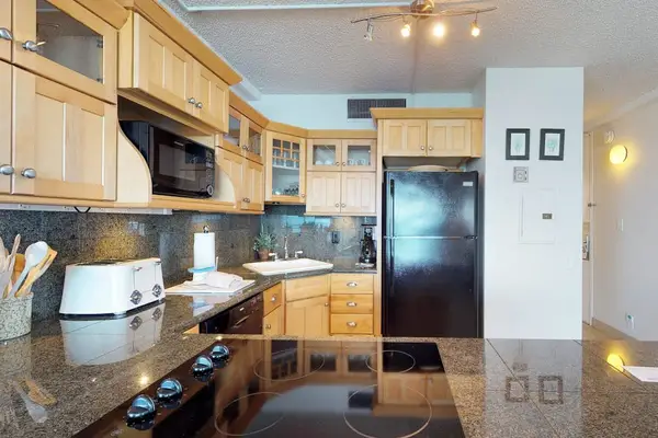 Fully stocked kitchen open to the rest of the unit with this open concept feel, lots of natural light.