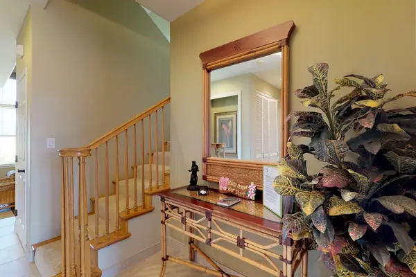 Welcoming Foyer & Staircase View