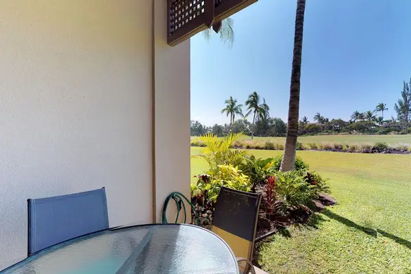 Covered Patio Dining with Lawn & Resort Views