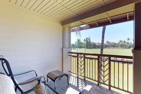 Private Covered Balcony with Tropical Views.