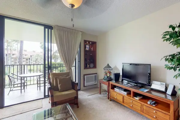 Relax in the inviting living room with plenty of natural light