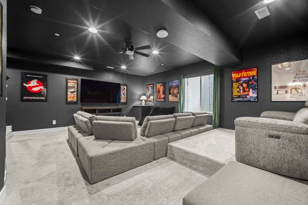 Modern home with firepit, grill, and cinema room