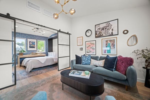 Modern studio with workspace and kitchenette