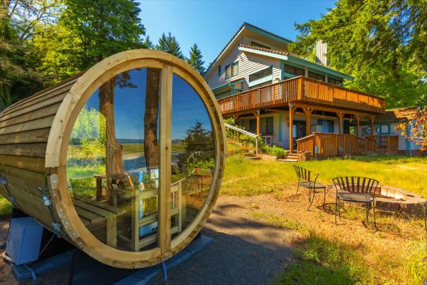 4BR waterfront home with beach access and views.