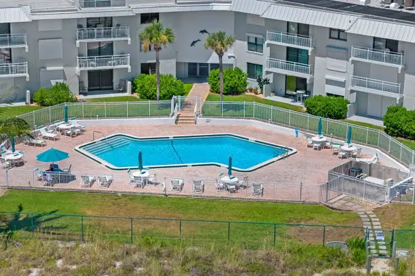 Beachside condo w/ pool – steps to the shore