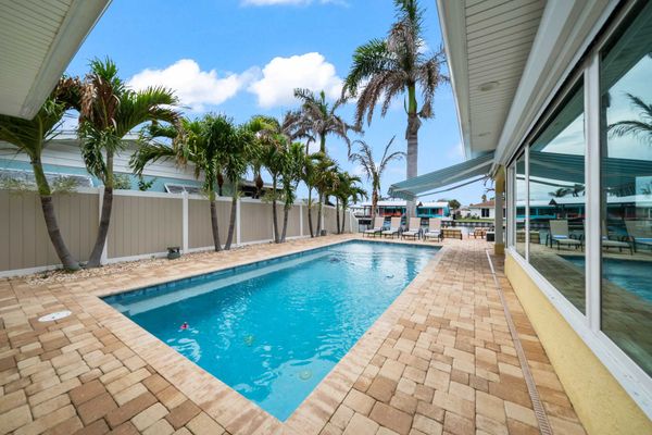 3BR canal home w/  pool & backyard