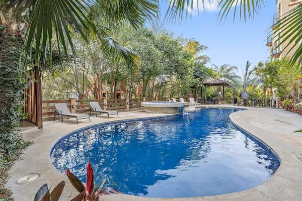 Condo with Shared Pool and Rooftop Terrace